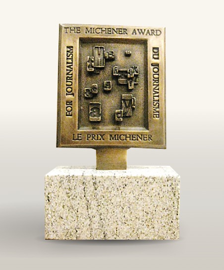 The bronze Michener Award trophy